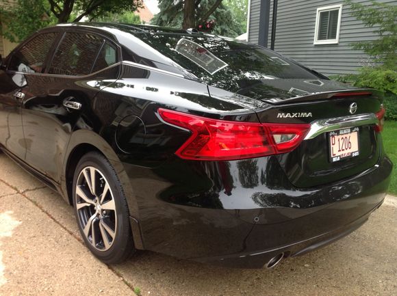 Could not find a Black  SL loaded with Spoiler so I added from Nissan parts dept. makes the rear end.