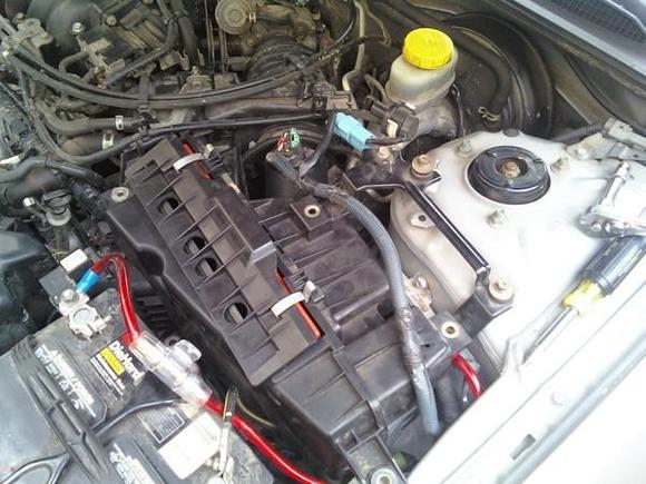 This is what the air box will look like with all of the bolts removed.