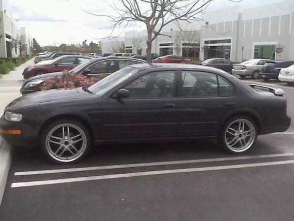 First Pic of Maxi after wheels.....will take some better ones shortly....

Liquid Metal Core 20&quot; Wheels Silver with Polished Lip Falken Fk452 245/30/20 Tires.....