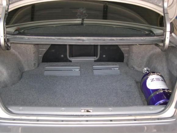 Full alpine with kenwood tv,dvd sound system with 4amps. 3rd amp under panel not cut out yet and 4th amp in console for center channel. Nitrous not in car anymore. Too many fills got expensive.