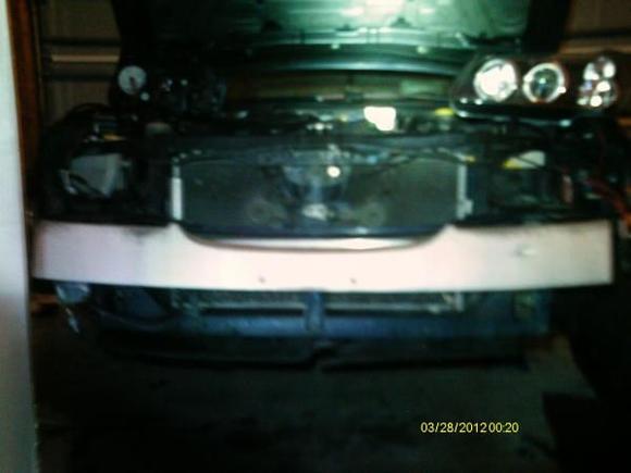 old bumper remove and cracked headlights.