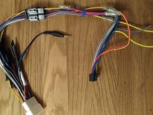 OEM-to-ISO adapter with Alpine harness