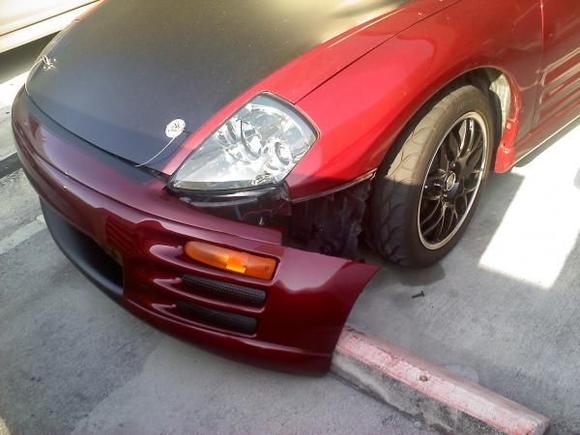 lol this is what happens then you have a lowered car and a messed up curb. i didnt know i pulled that far forward and when i backed up this is what happened.