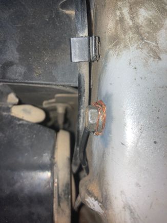 Spliced top ground above driver headlight 