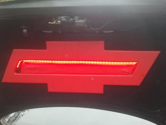Cutout Chevy logo, vinyled, and lit with LEDs