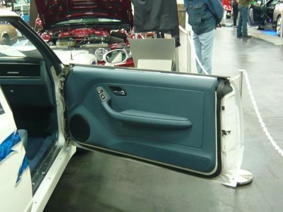 My custom door panels holding a Dynaudio 8" woofer.