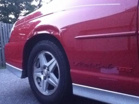 Red ss symbol - dent above wheel well - bought it with that