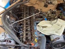 I wish I could show you the old valve cover gasket, it was brittle hard and in like ten pieces. We might be leaking oil somewhere else too, but we definitely were here.