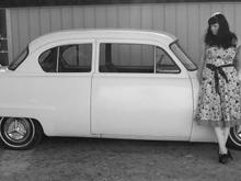 My recently purchased 53 Plymouth Cranbrook. Original inline 6 and three on the tree manual. Previous to my ownership, she's been shaved and lowered, floorpans were been replaced and interior redone. The top is probably getting completely replaced. Small patch panels and lead fill needed where chrome was removed some day.