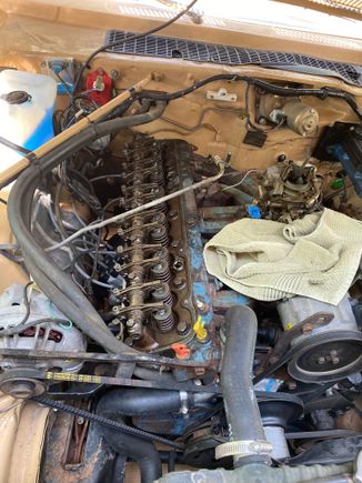 I wish I could show you the old valve cover gasket, it was brittle hard and in like ten pieces. We might be leaking oil somewhere else too, but we definitely were here.