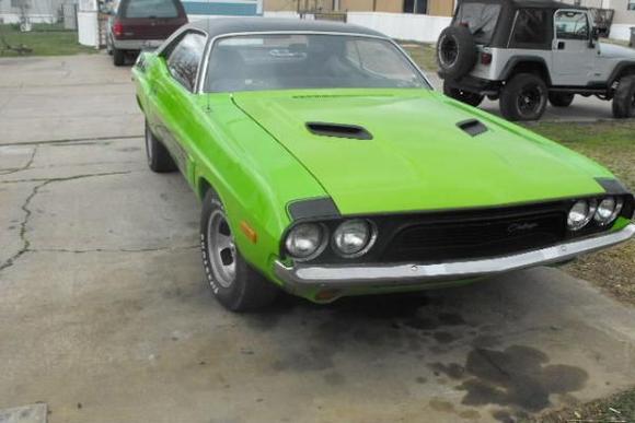 I know the color doesnt exactly match but I painted the hood just as a test to see if I could even do automotive paint. So I'm fixing to start stripping her down and redoing the whole car. Also you should go read the story on all the sh!t I went through painting the hood lol its under general discussion under the thread Crazy Sh!t.