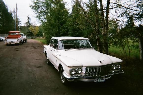 lola, the day i bought her, and gracen's van in the back. caravaned back to town with him, with the shoddiest front end EVER.