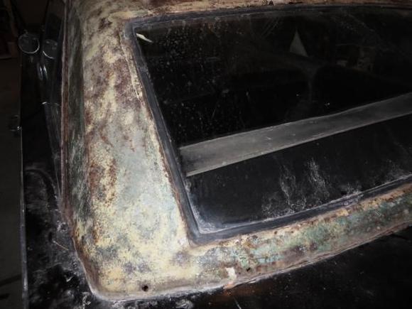 back window beneath vinyl on 1967 Plymouth fury III