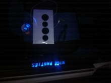 Custom LED door sill. Drivers side says Mustang. Wired into dome light. The circles are vynal for my custom LED cup holders