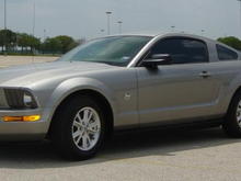 2009 V6 Mustang with spoiler and automatic. Vapor Gray colored!