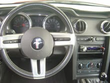 Leather steering wheel & six-gauge cluster swap.