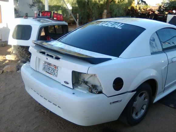 Custom black vynal fuel door. Beats paying $50 for an aftermarket fuel door. Rear lights and side reflectors out for smoking