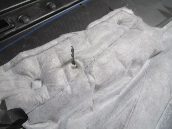 Showing slit open insulating pad to allow attachment wires to pass through