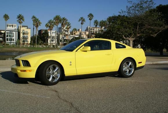Yellow Mustang driver side