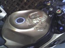 custom paint on my gsx-r stunt bike. 07 cadillac metallic gold paint, with a airbrush cadillac symbol. Sorry i was not about to put a big "Z" on my gas tank.