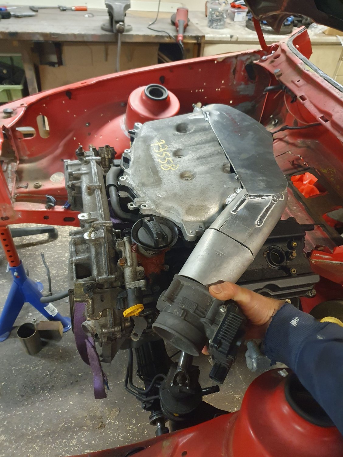 Upper half of plenum had to be rebuilt for hood fitment