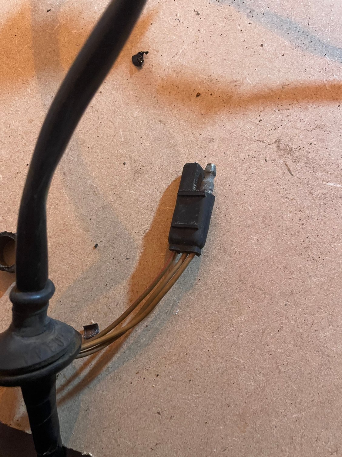 Two pin connector. (Brown and brown/red).  Not sure what this is for but the brown/red connects to the brown/red on the 3 pin plug that i think is fuel sender unit so assuming related.
