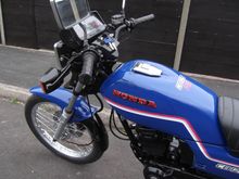 Restored this old Honda motorbike, all re-painted with aerosols.