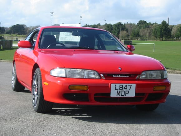 Nothing like as good a paint job as yours but I painted my Son's Nissan Silvia in Ford Radiant red!