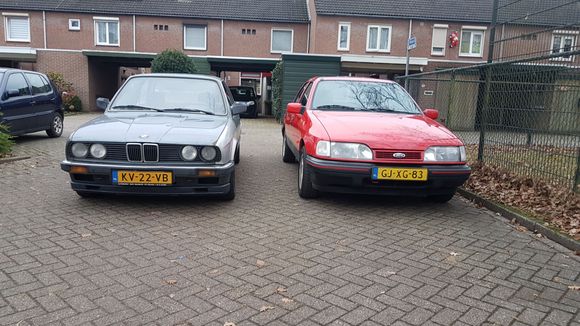 My trusty rust bucket E30 and the new sierra