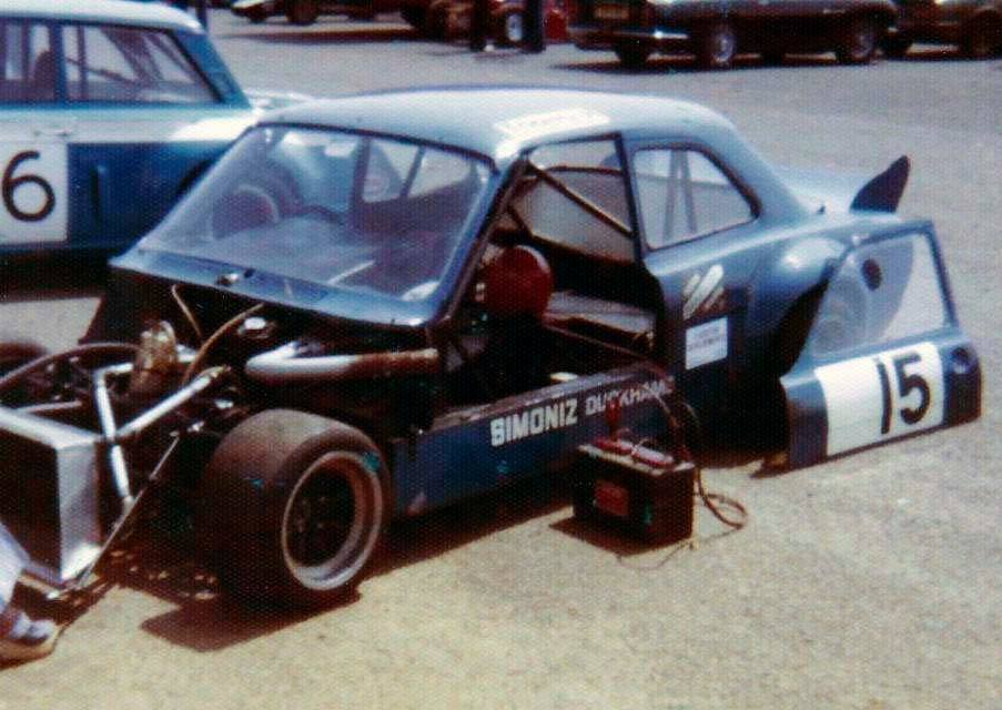 The 'Lowline' Hart Escort LT40 Super Saloon in the Silverstone paddock. Notice the half doors sitting over the F1 style safety pods.