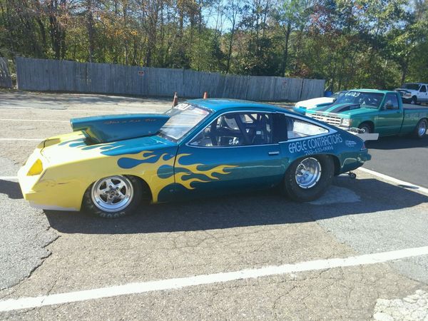 1975 MONZA AND 28' TRAILER