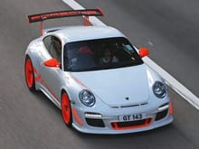 This one is very cool. Probably not factory but like a Carrera White and fluorescent Orange.. 