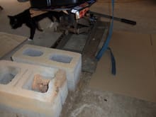 Cinder blocks as bump stops for the jack.