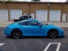 It's hard to capture the Miami Blue color. I found my phone did the best job. I tried playing with the white balance on my camera, just no luck capturing the color. At least the dealership installed the clear LED side markers.