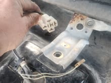 I believe this is the wiper motor connector (motor is missing)