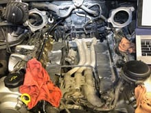 You can see the stupid location of the starter under the aluminum coolant pipes.  Original pipes were plastic and when they failed Porsche replaced them at no cost with aluminum.