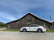 old car and old barn