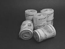 Step One: Locate suitable rolls of $100 bills lying around the house. Choose the two that are packed the tightest. (NOTE: $50s, $20s, & $10s are unsuitable for this application.)