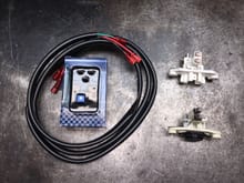 Dave Barton adjustable remote voltage regulator, 6' harness, brush holder, and stock voltage regulator/brush holder.