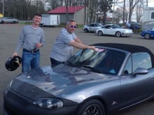 1st DE.  Mid-Ohio Porsche Club in my MX-5.   Ceremonial instructor removing the D vinyl...up to C Group on day 1!