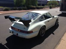 This is the GT base with a 55" 996 cup wing.

The width is perfect, you have to make the uprights and the base Thales some massaging to get it to fit but the downforce is worth it. I've run the 3.8 tail, but it's heavier and doesn't give the same downforce. I don't have any real data but it seems like much more drag with the 3.8 base.