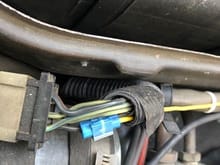 This is where I tapped into the black and yellow wiper ignition controlled wire by the wiper motor.  The yellow wore runs over to the blower fan and through the existing pass through up to the controller along the 14 pin wiring bundle.