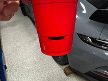 If you do not have a measuring cup I find this works great and no need for a funnel either. Up to that mark on the cup moved the gauge 25%