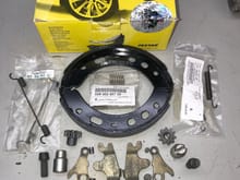 New parking brake shoes, return springs, hold down springs, with used actuating and adjusting hardware.