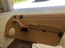 door card or panel - need to remove 3 hex nuts in handle and pull up on door release to unhook