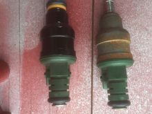All the fuel injector O-rings and caps were shot, so I cleaned the injectors and changed the filters, O-rings and end caps, along with repainting them the original black