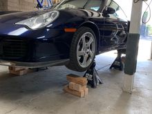 Yup on Jack stands to tackle a leaky gearbox oil pan gasket and an axle cv boot that is about to fail. 