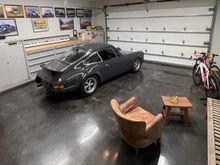 tiny 2 car garage at home, decide to keep most cars in warehouse and one at home and make it into a small man cave