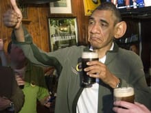 obama drinking a beer