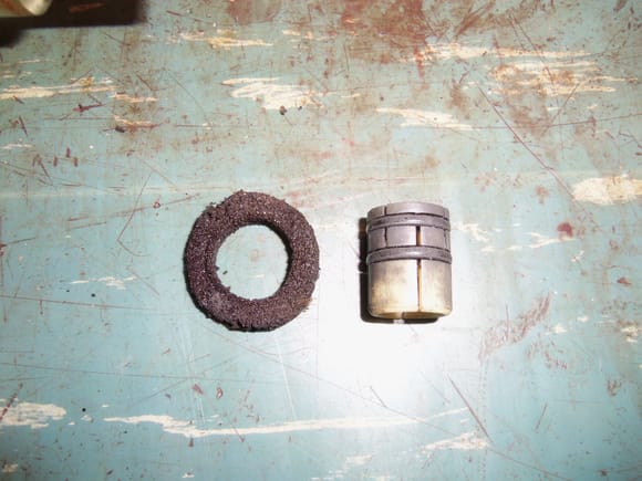 Dust seal and bushing, showing O-rings.